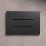 NATIVA Placca Quadro JP1NM nero opaco su parete in cemento vista frontale